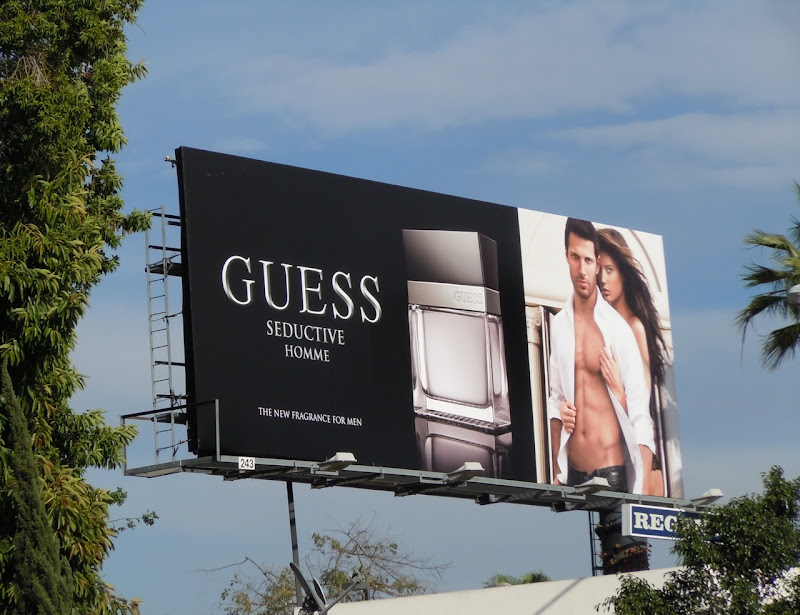 Guess Seductive Homme fragrance billboard
