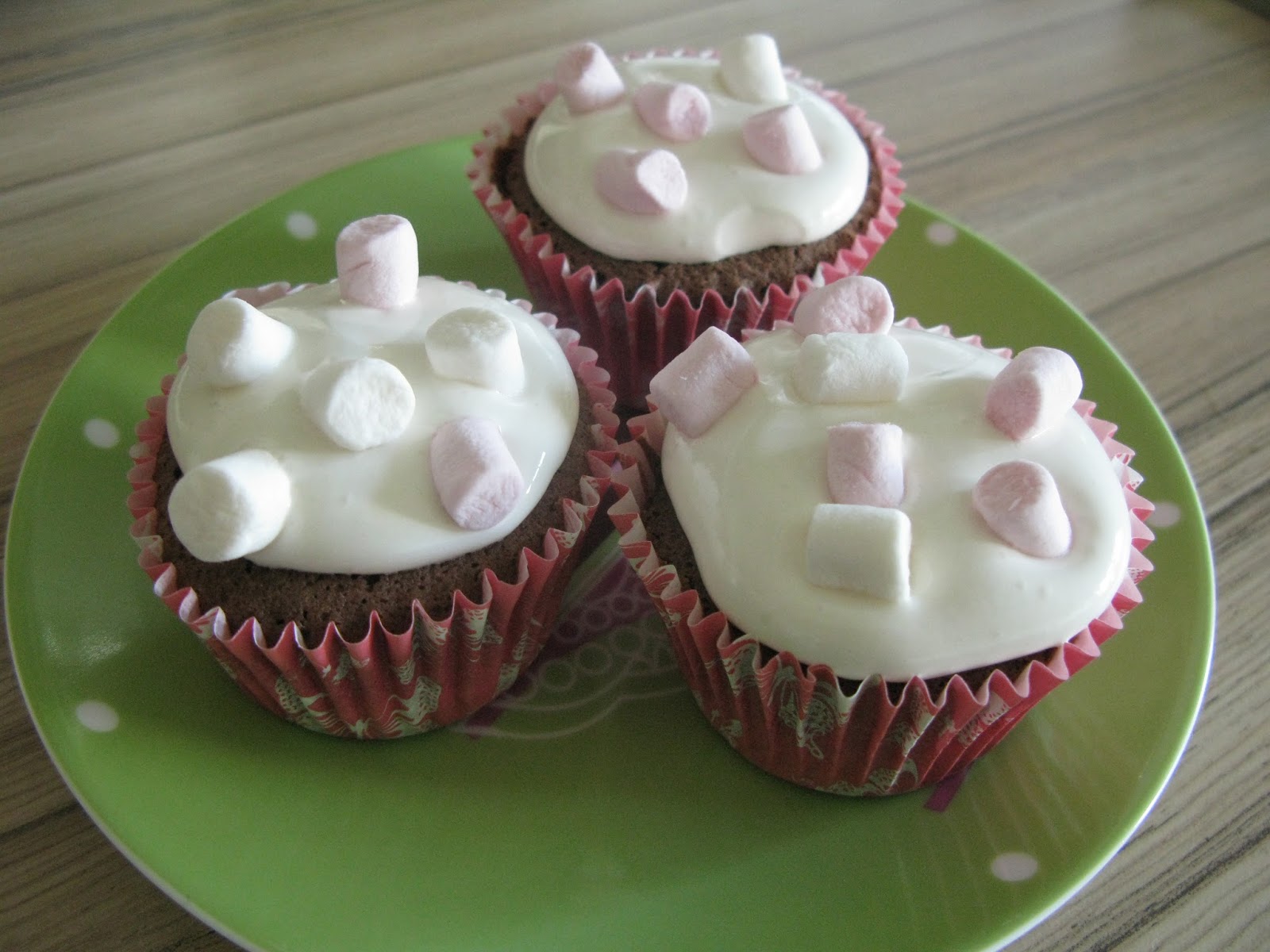 Soft marshmallow topped chocolate cupcakes