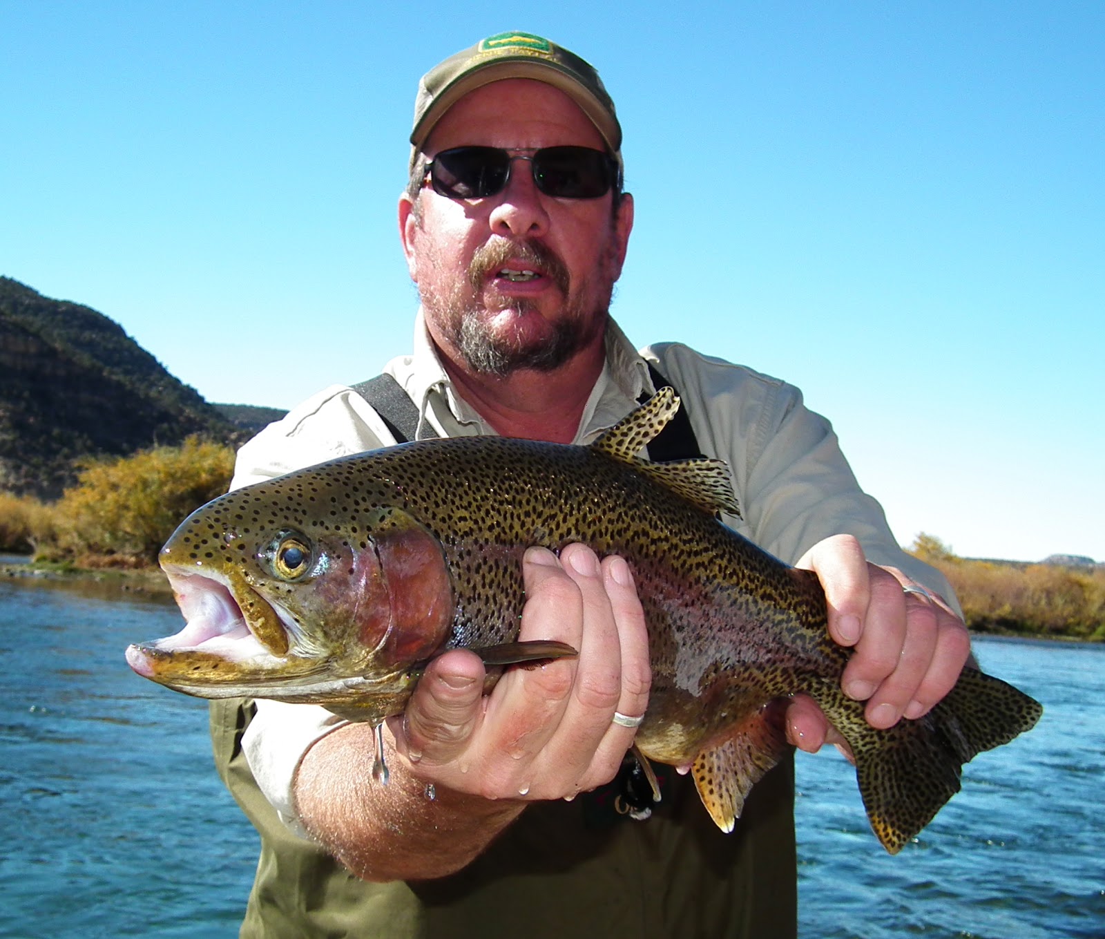 LICENSED TO FISH NM Game & Fish Officers Take Stock of Trophy Trout in