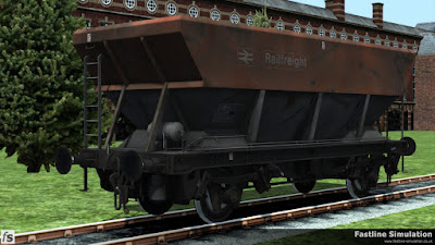 Fastline Simulation: A conversion of a Railfrieght flame red and grey liveried HEA coal hopper into an HSA scrap wagon. THe patch-painted increase to the tare weight tells us that the conversion was acheived by filling the hopper bottoms with ballast to create a level surface. The body is already starting to show signs of scrapes and batters from unloading with grabs and magnets.