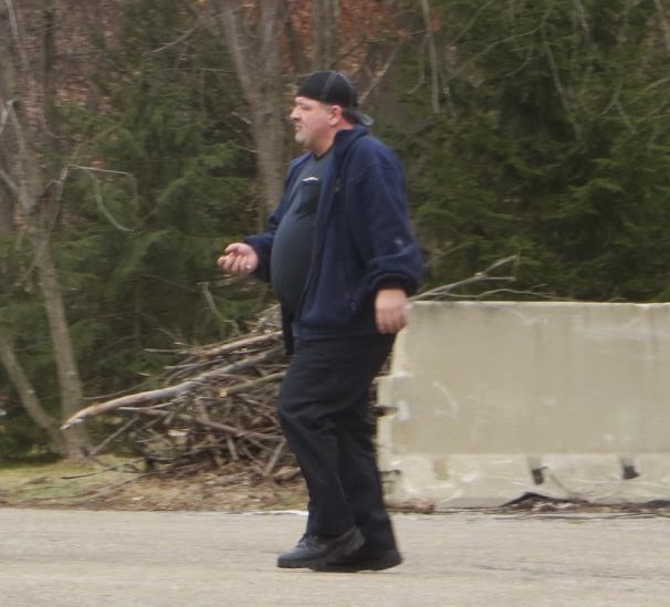 Brady Lake Village cop John Delillo doing the Fat Ass Shuffle.