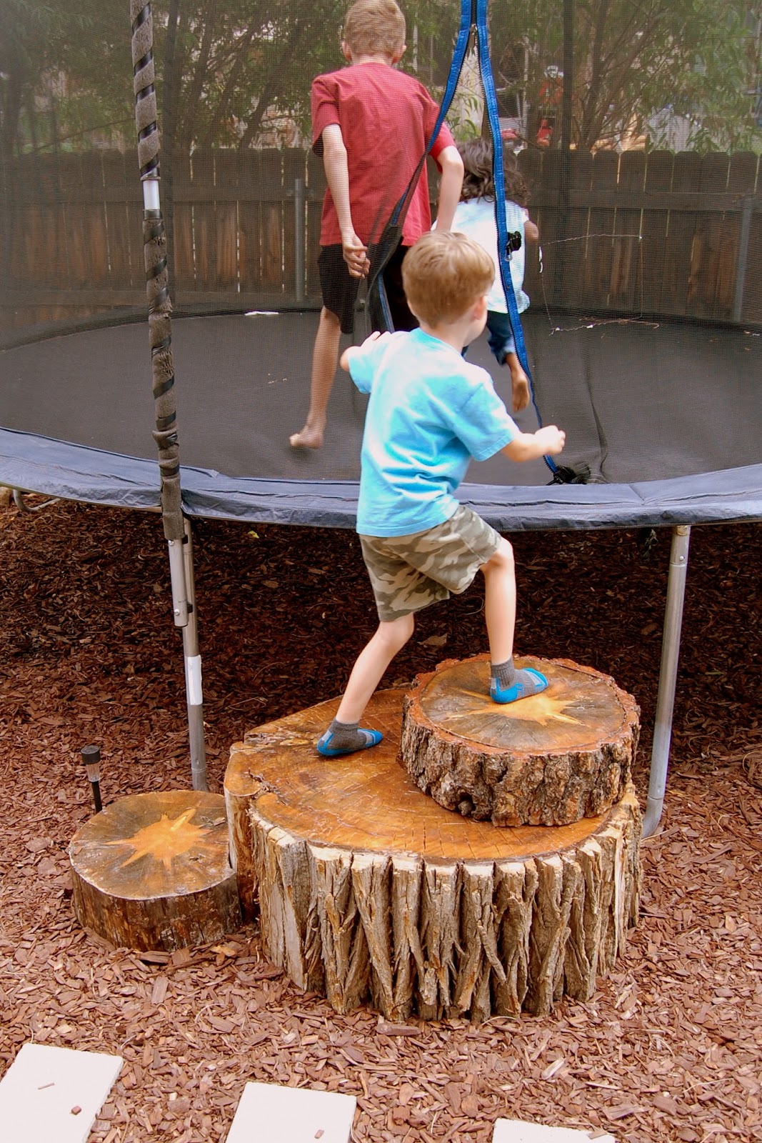 "C" is for Crafty Tree Stump Trampoline Steps