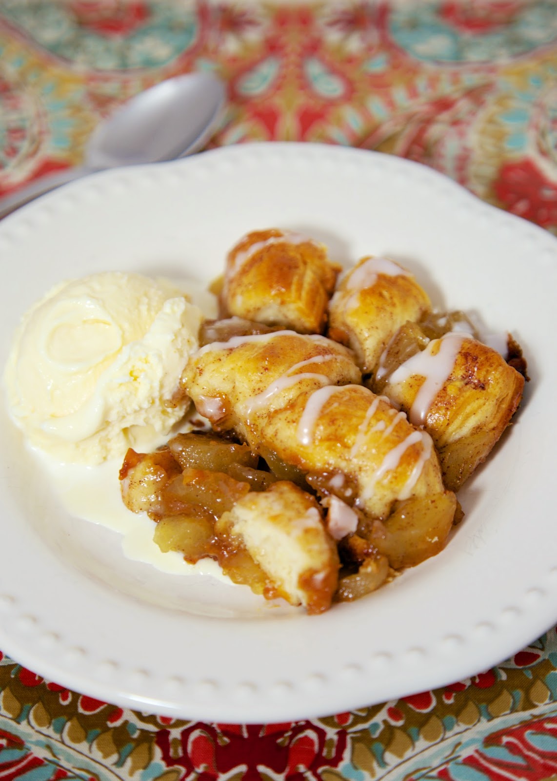 Apple Pie Bubble Up- a sweet version of our favorite bubble up recipes! Made with apple pie filling, Pillsbury biscuits and butterscotch chips. Great holiday dessert!