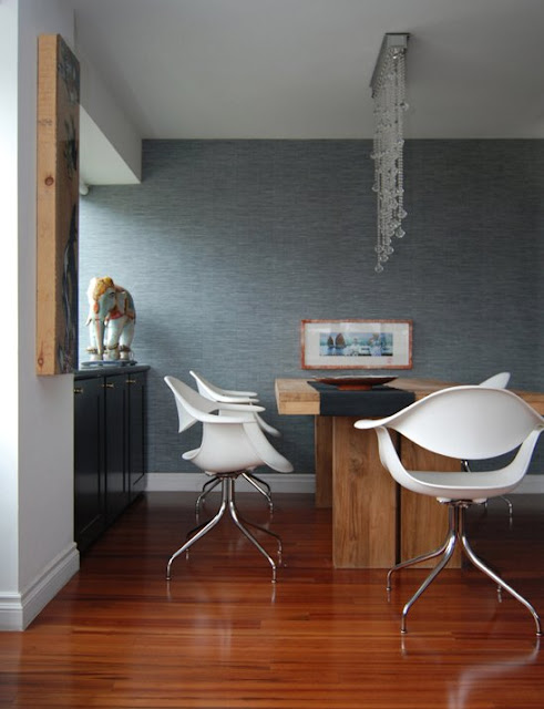 dining room with wood table and white plastic chairs