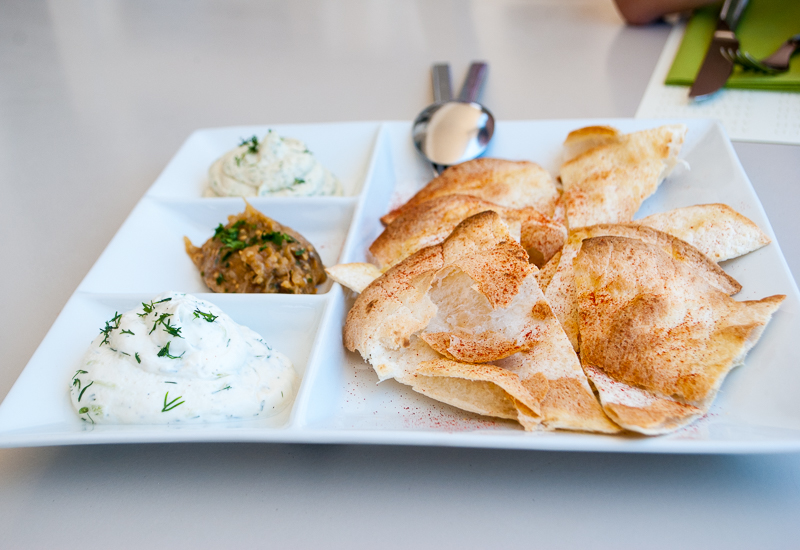 Pita bread in Fira, Santorini, Greece Pita bread and dips, greek food in Fira, Santorini, Greece