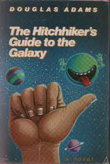 A planet with a tongue sticking out, and a hitchhiking thumb on the cover