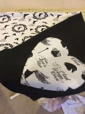Turn scarf right sides out. Turn scarf right sides out.