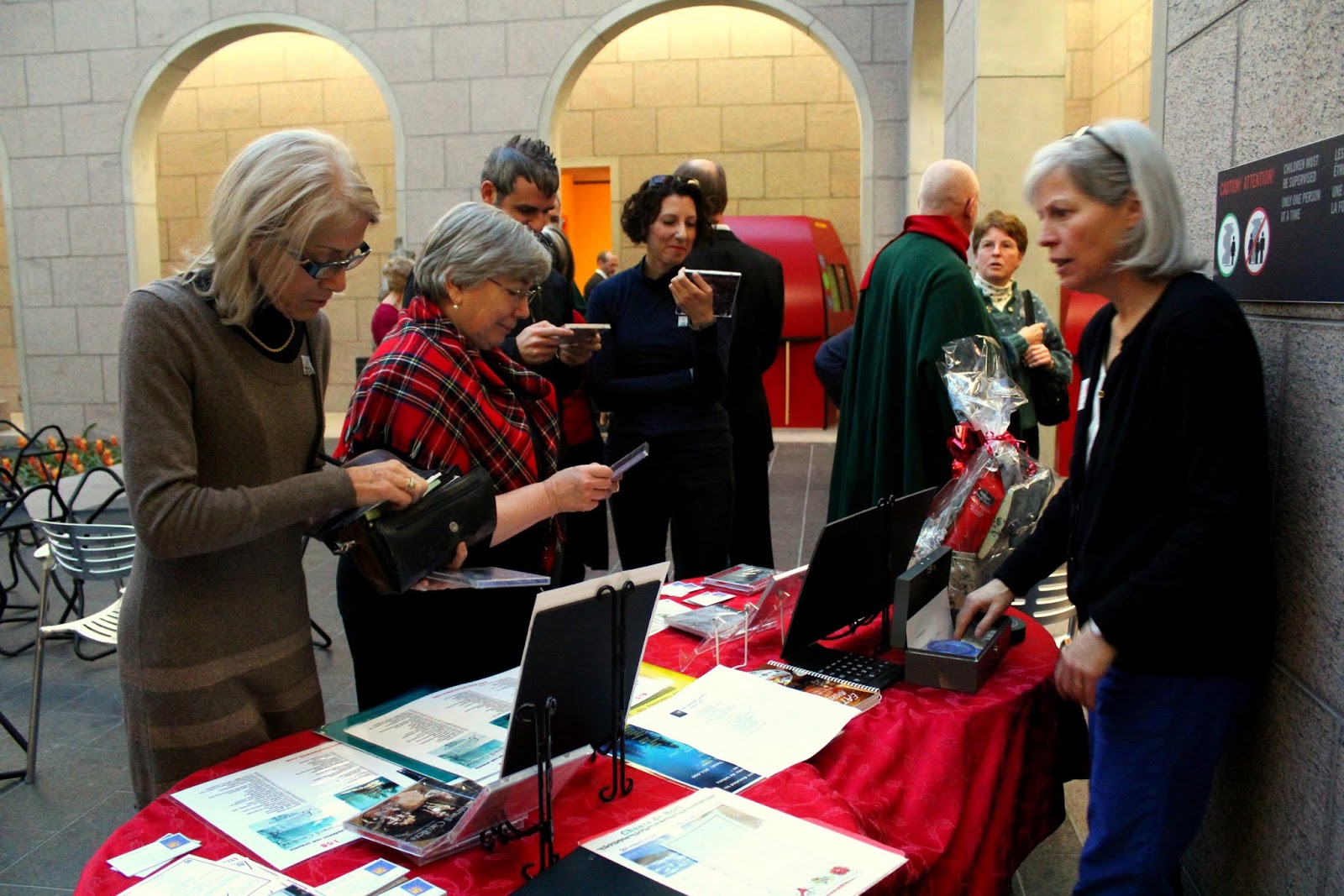 Thanks to Laurie for doing the CD table! Andrea McCrady on the right discusses the concert with our director, Pierre Thanks to Laurie for doing the CD table! Andrea McCrady on the right discusses the concert with our director, Pierre
