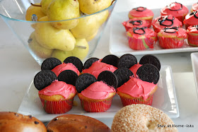 Minnie Mouse cupcakes with Oreo ears for a birthday party