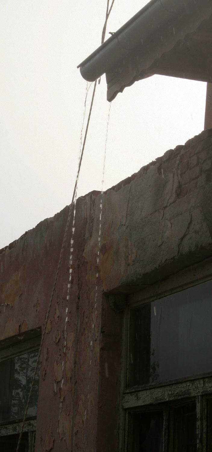 Pouring off the guttering Pouring off the guttering