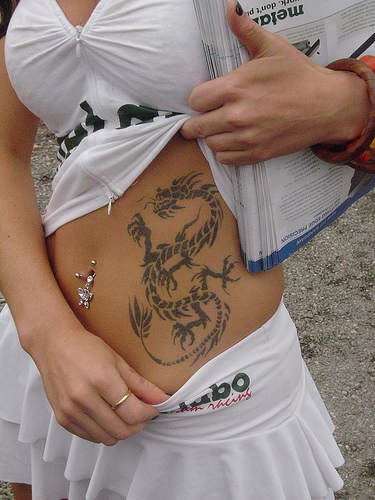 Girl with Dragon Tattoo on her hip