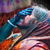 Shy Indian Girl Playing Holi Colors