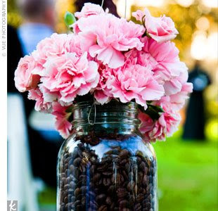 mason_jar_filled_with_coffee_beans_the_knot
