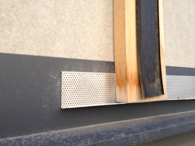 strapping held 2" off above north window flashing detail
