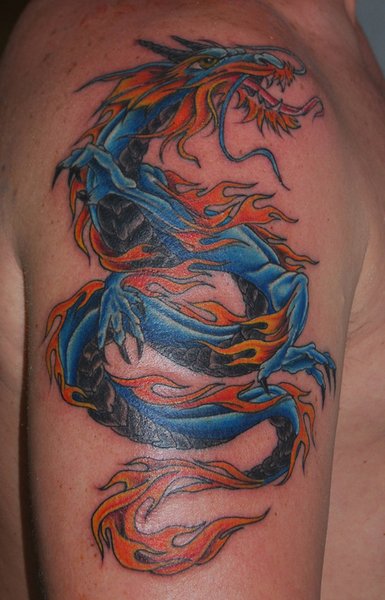 Fashion Clothes Designing And Tattoos: tattoos for men on arm dragon