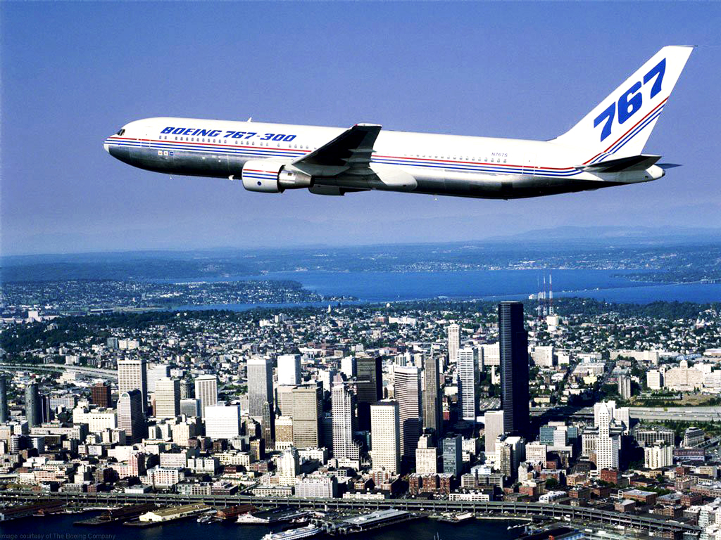 http://4.bp.blogspot.com/-xHKyVzUHoKk/TyrRRfPrS7I/AAAAAAAAAgs/8tNvmFUsugA/s1600/Boeing_747_Plane_Cityscape_Skyscrapers_HD_Wallpaper-Vvallpaper.Net.jpg