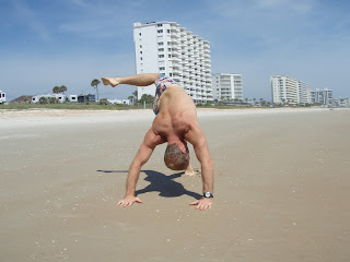 Sean Donovan busting out some beach yoga