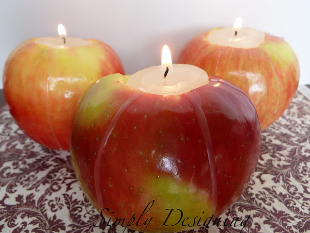 Apple Votives - perfect fall decor that is so simple to make!  This would be perfect for a Thanksgiving centerpiece tablscape or for fall mantle decor!  See full tutorial by clicking on image!  #diy #fall #falldecor #thanksgiving #thanksgivingdecor #tablescape #centerpieces #apples #votives #candles