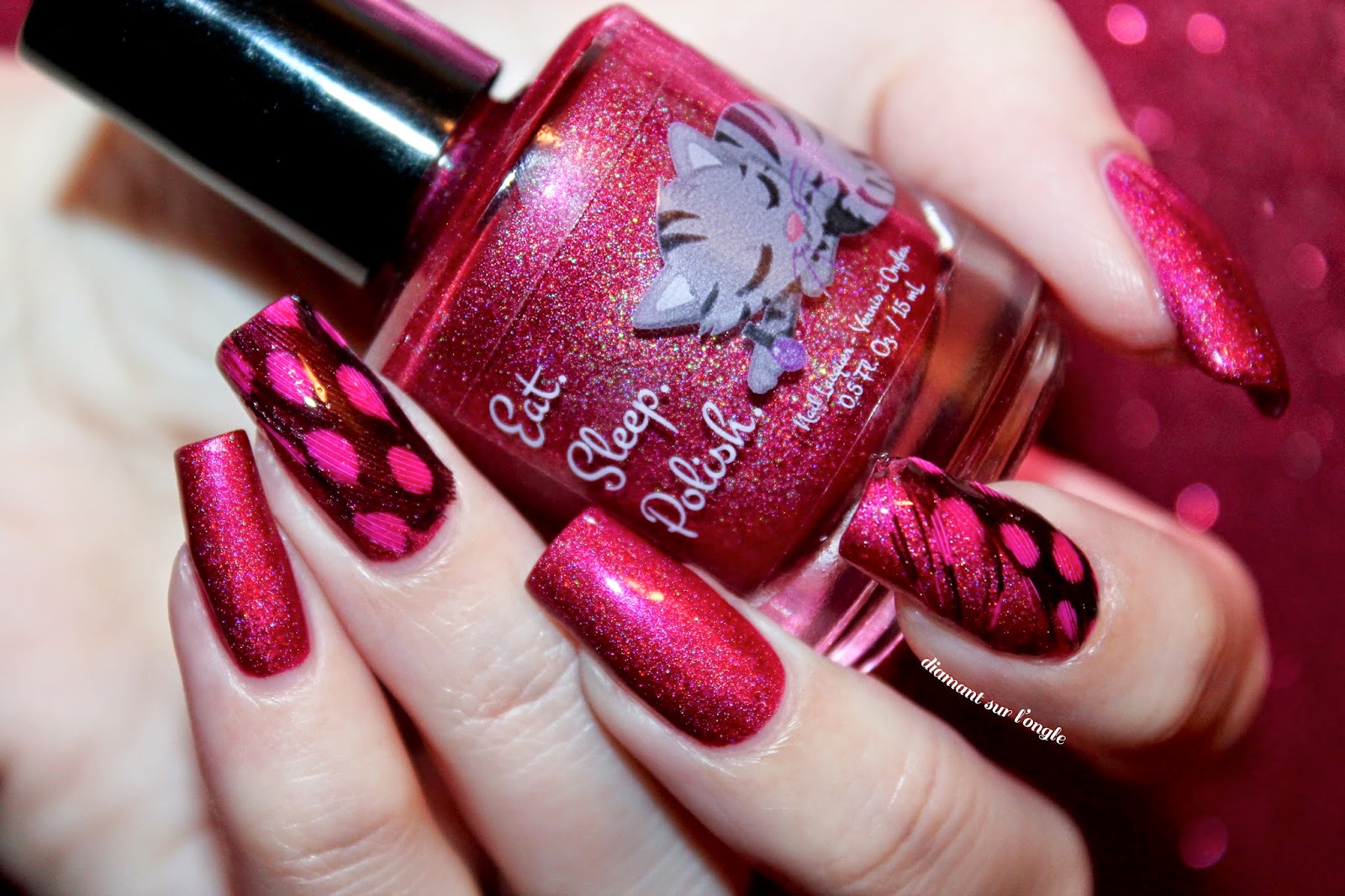 Feather nail art with "Glitterberry" by Eat.Sleep.Polish.
