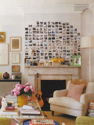 fireplace, cream chair, photos, books