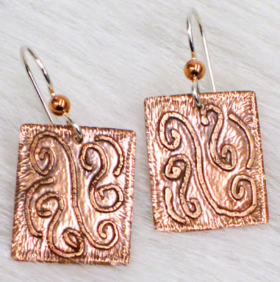 Copper earrings by Pat Jones