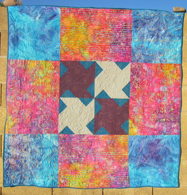http://quiltparadigm.blogspot.com/2014/01/first-finish-of-2014.html