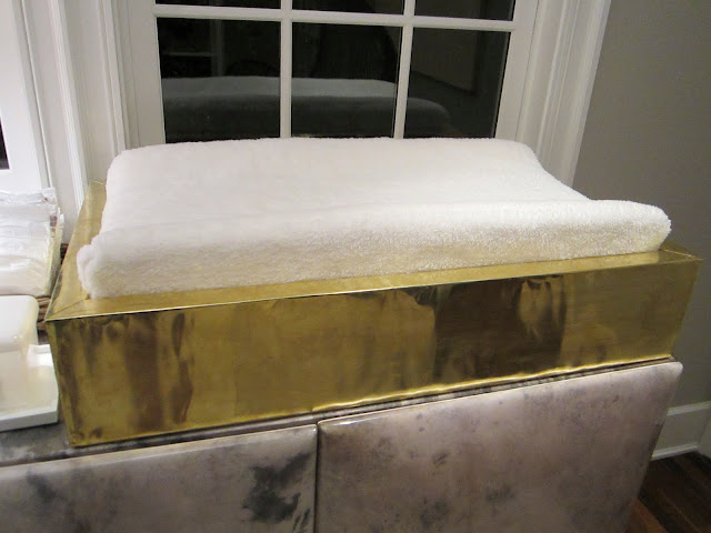 Close up of the gold baby changing station