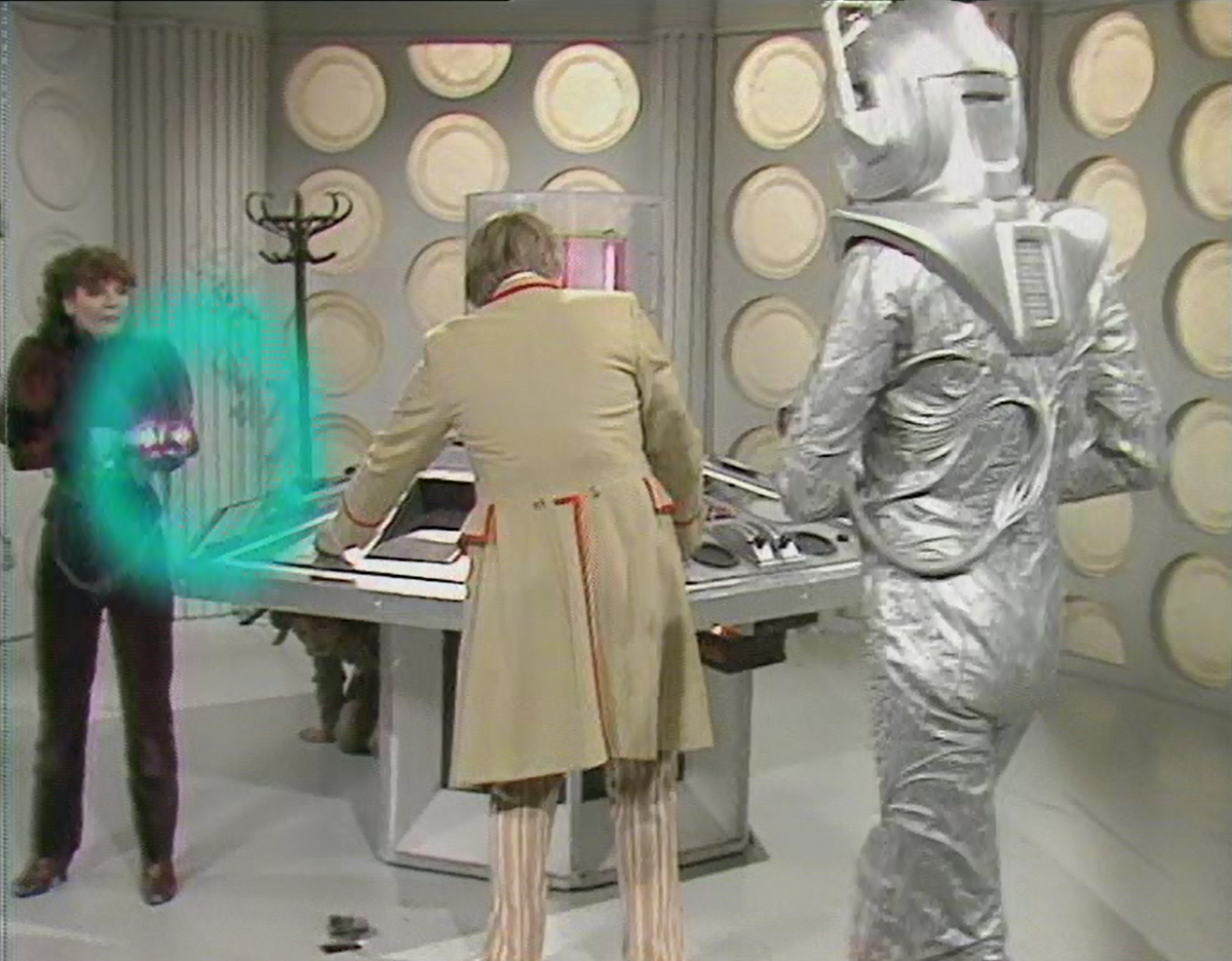 Nyssa shoots a Cyberman Nyssa shoots a Cyberman