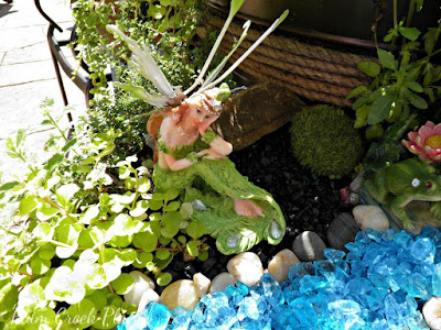 Fairy Garden 2015 made from thrift store finds.