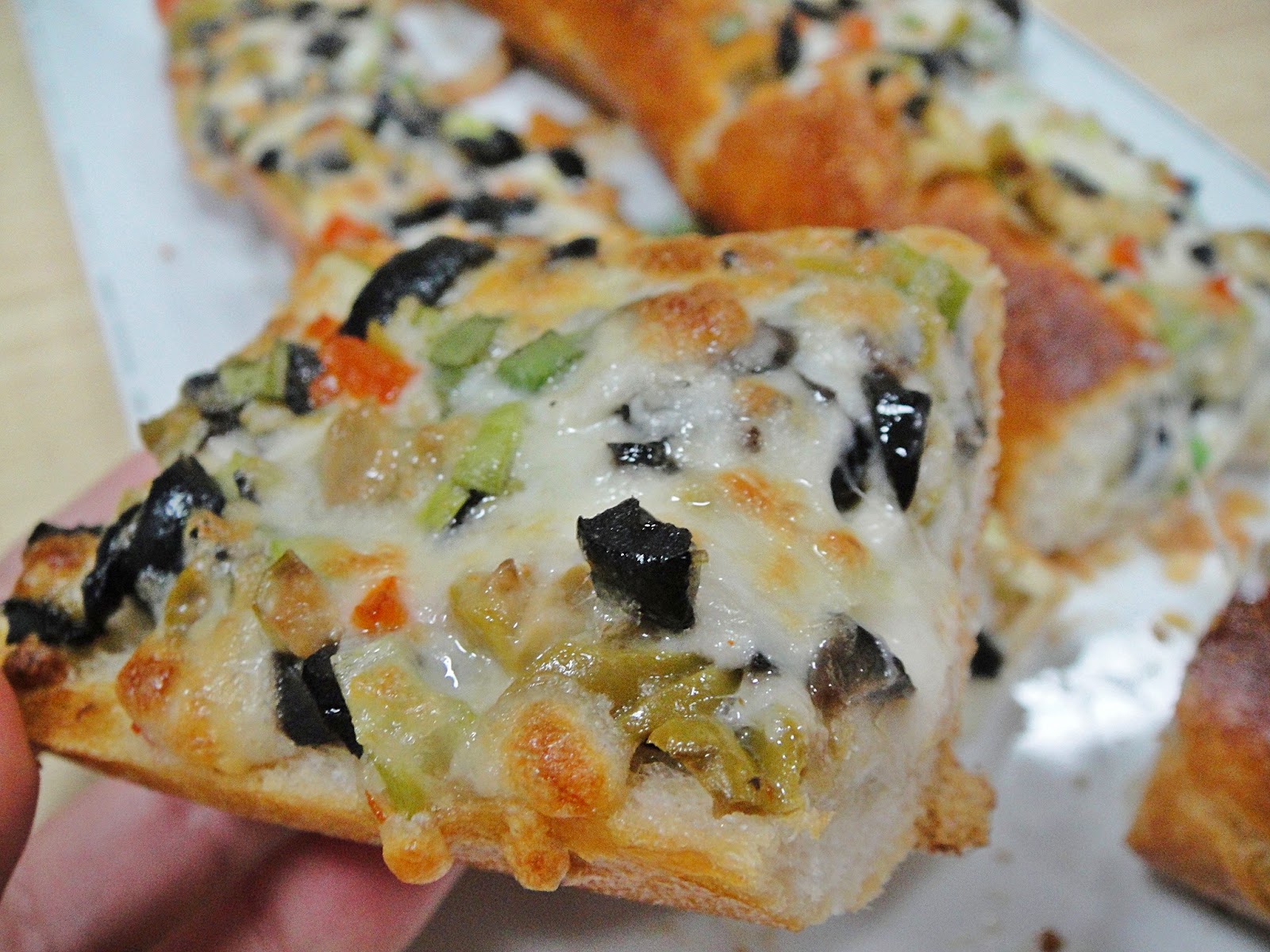 Maryam's Culinary Wonders 713. Cheesy Olive Baguettes