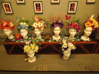 Headpieces used in Alice in Wonderland Production at Paso Robles High School Alice in Wonderland at Studios on the Park, headpieces made of flowers