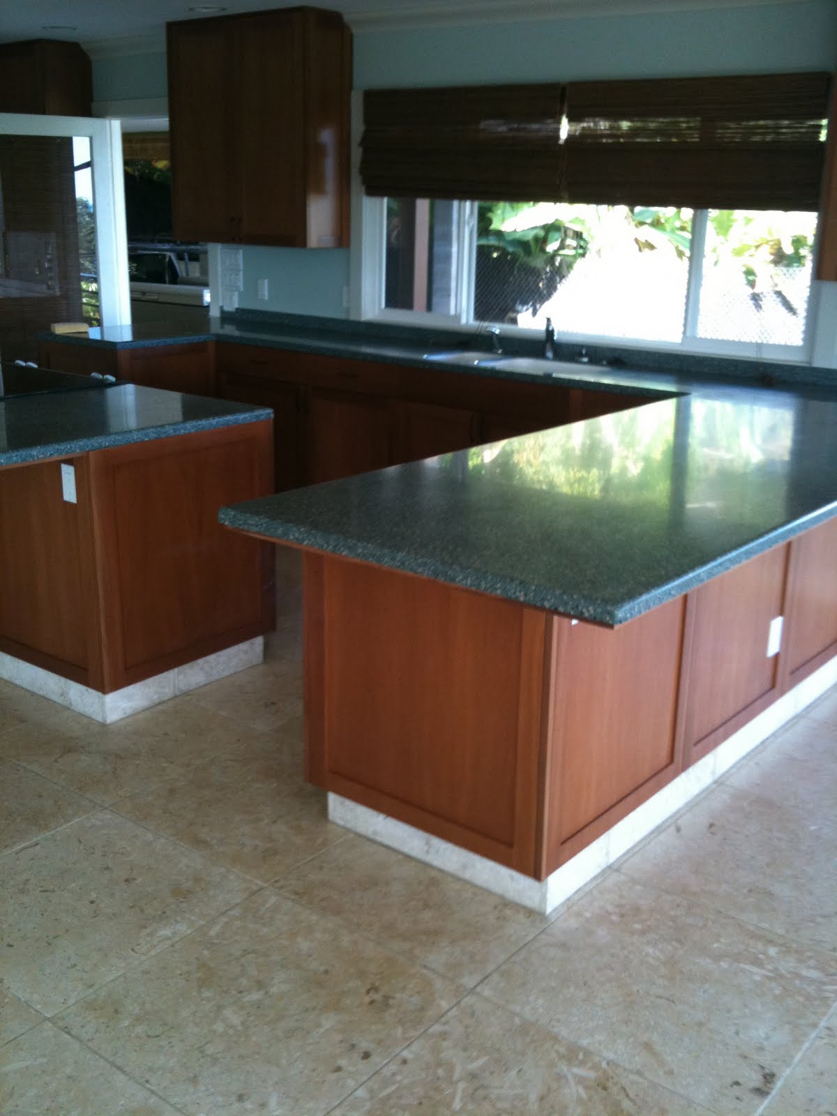 Kitchen custom cabinets German Kitchen Lulani St. Kaneohe, HI (African Mahogany/Shaker)