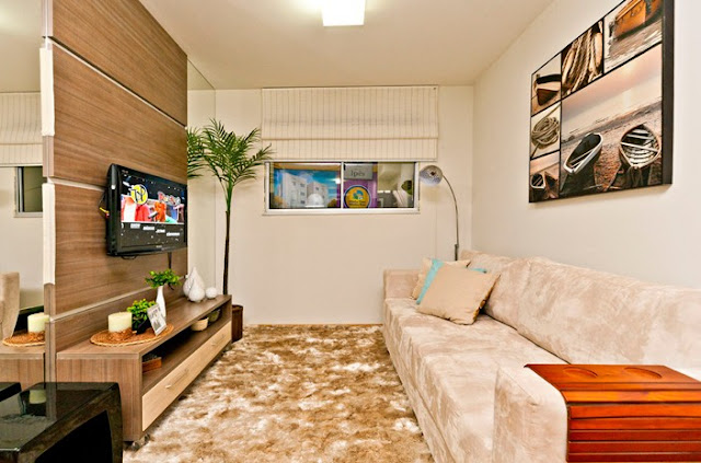 decoracao de ambientes pequenos simples:Os espelhos do painel da Tv, dão uma boa ampliada no ambiente. decoracao de ambientes pequenos simples:Os espelhos do painel da Tv, dão uma boa ampliada no ambiente.