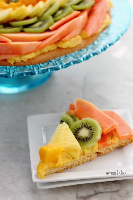 I love tropical fruit and this pizza dessert has it all! Papaya, pineapple, and mango on a cookie crust.