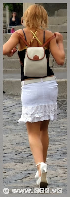 Girl in white skirt on the street