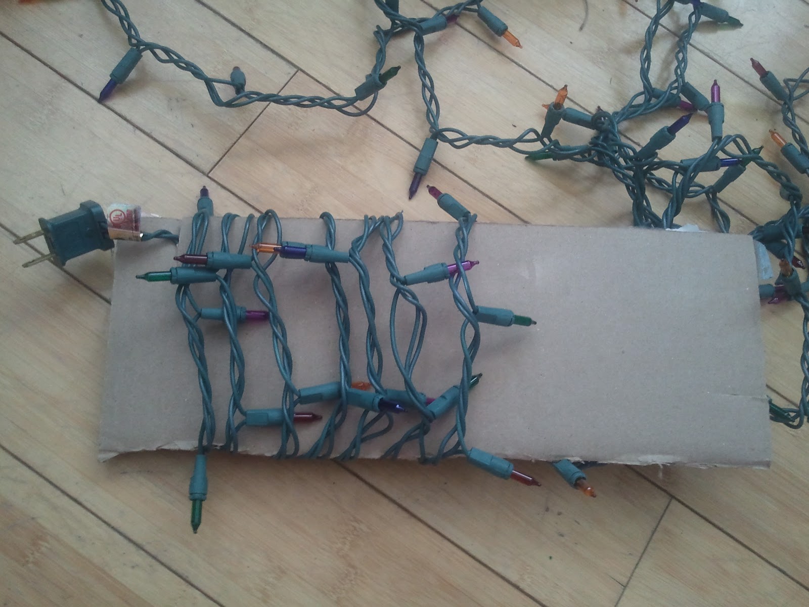 Apt Garden DIY Cardboard Christmas Lights Organizer