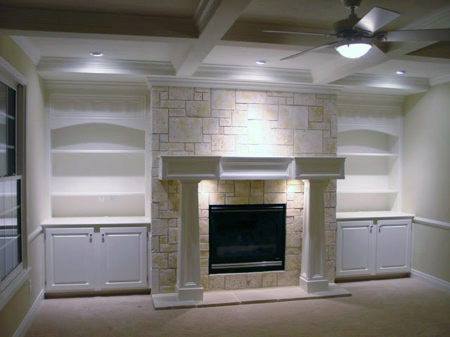 fireplace mantel and bookcase