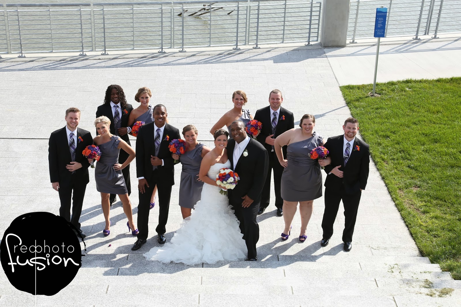 gray bridesmaids dresses with colorful bouquets or purple, orange, and pink mokarafloral.com