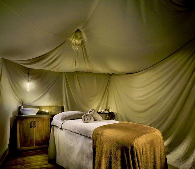 luxury small spa room designing ideas mixed with extra large canopy for narrow bed plus wooden cabinets
