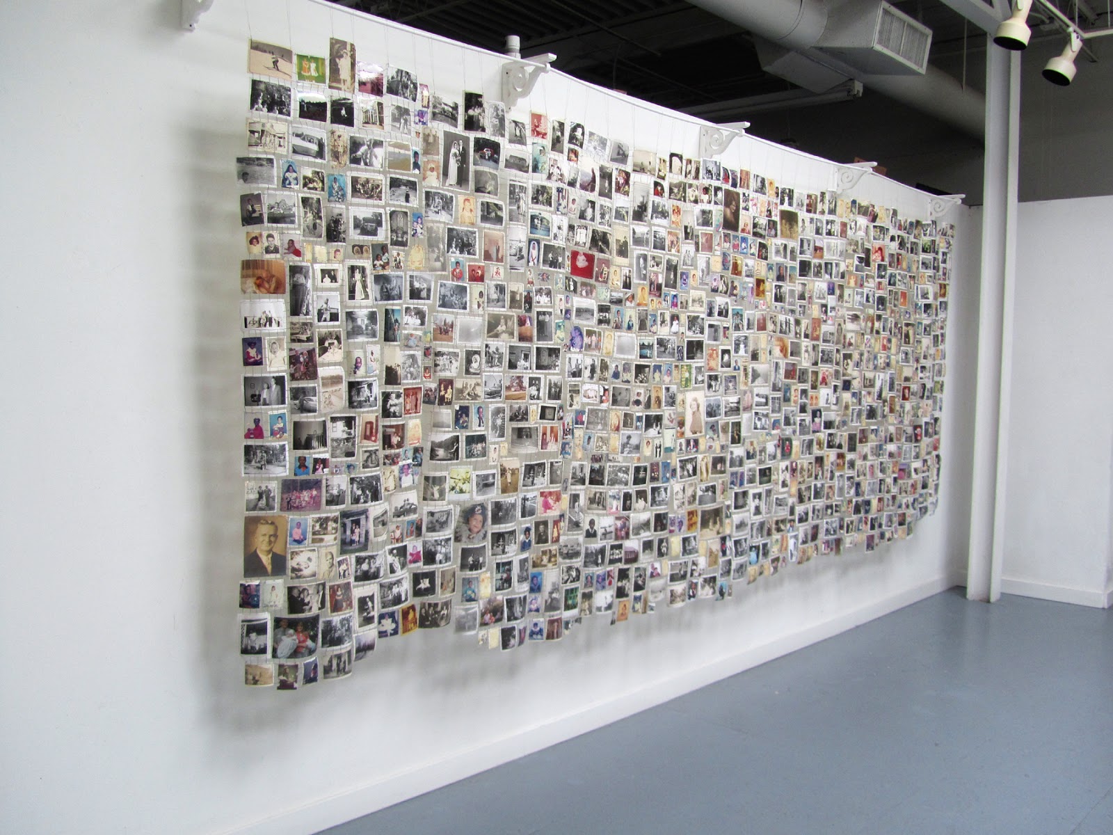 Art In Stitches Grid of Photos hanging and now in search of a title