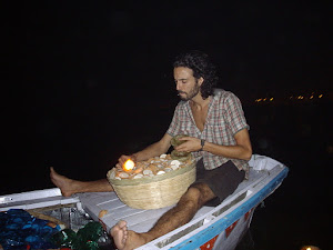 Releasing the "Diya's(Wax lamps)" into the Ganges river from  our boat.(Thursday 10-11-2011)