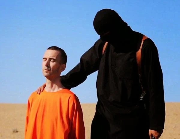 'Pure Evil': ISIS Appears to Kill British Hostage in New Video, British hostage David Haines, Syria, ISIS executes British aid worker David Haines, website, journalist James Foley, President Obama condemned, "barbaric" murder