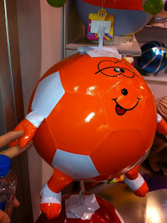 beach ball with arms and legs