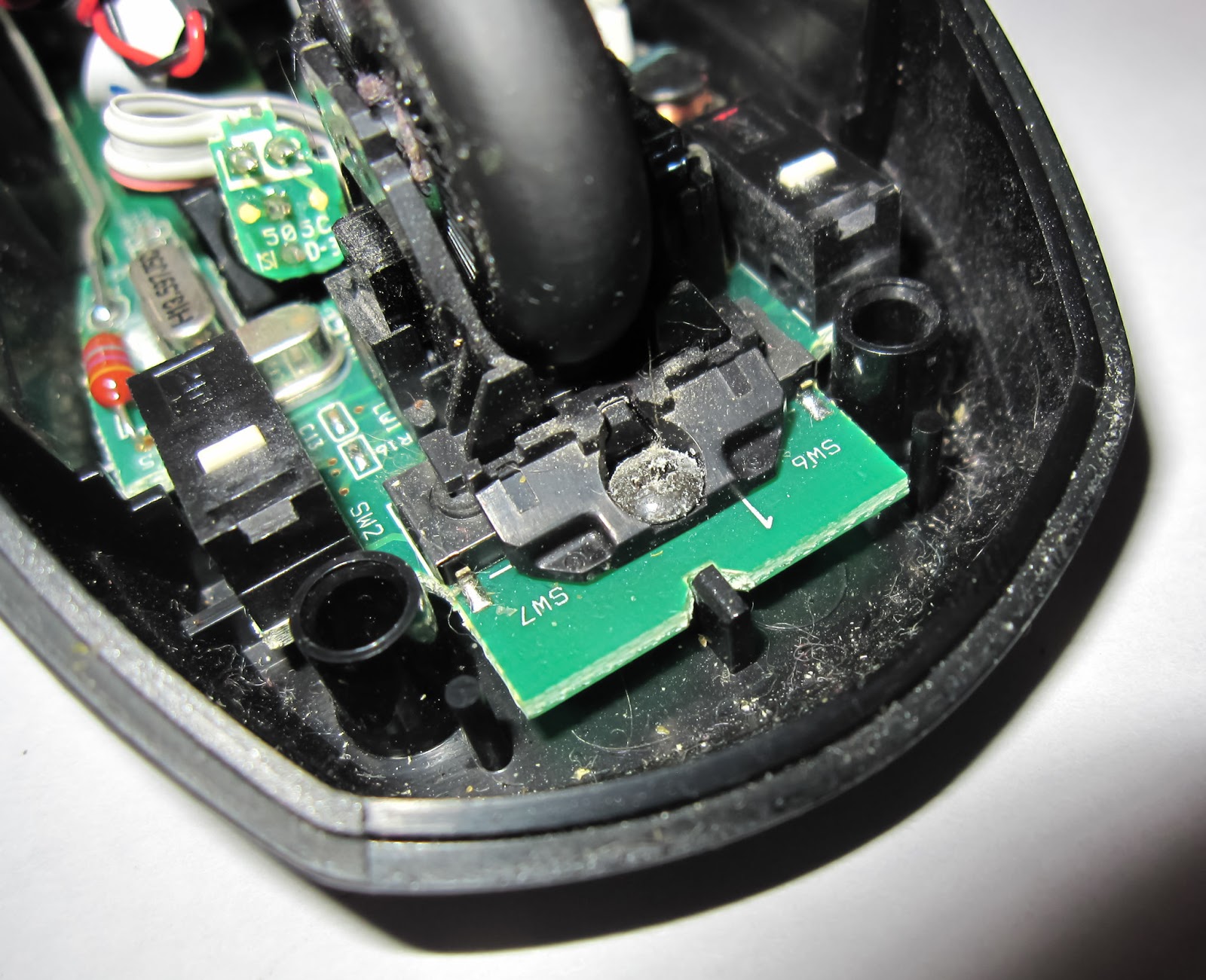 Tech for Passion Fixing broken mouse button on a Logitech LX6 cordless