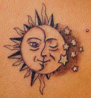 tattoo-design with some celestial patterns: the sun, moon, and stars