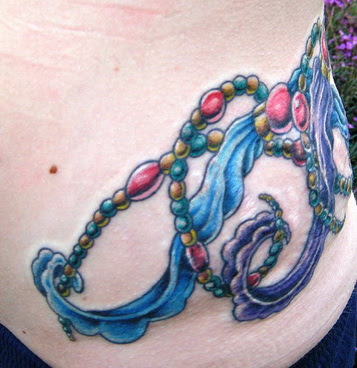 Hip tattoo for girl,uncommon tattoo