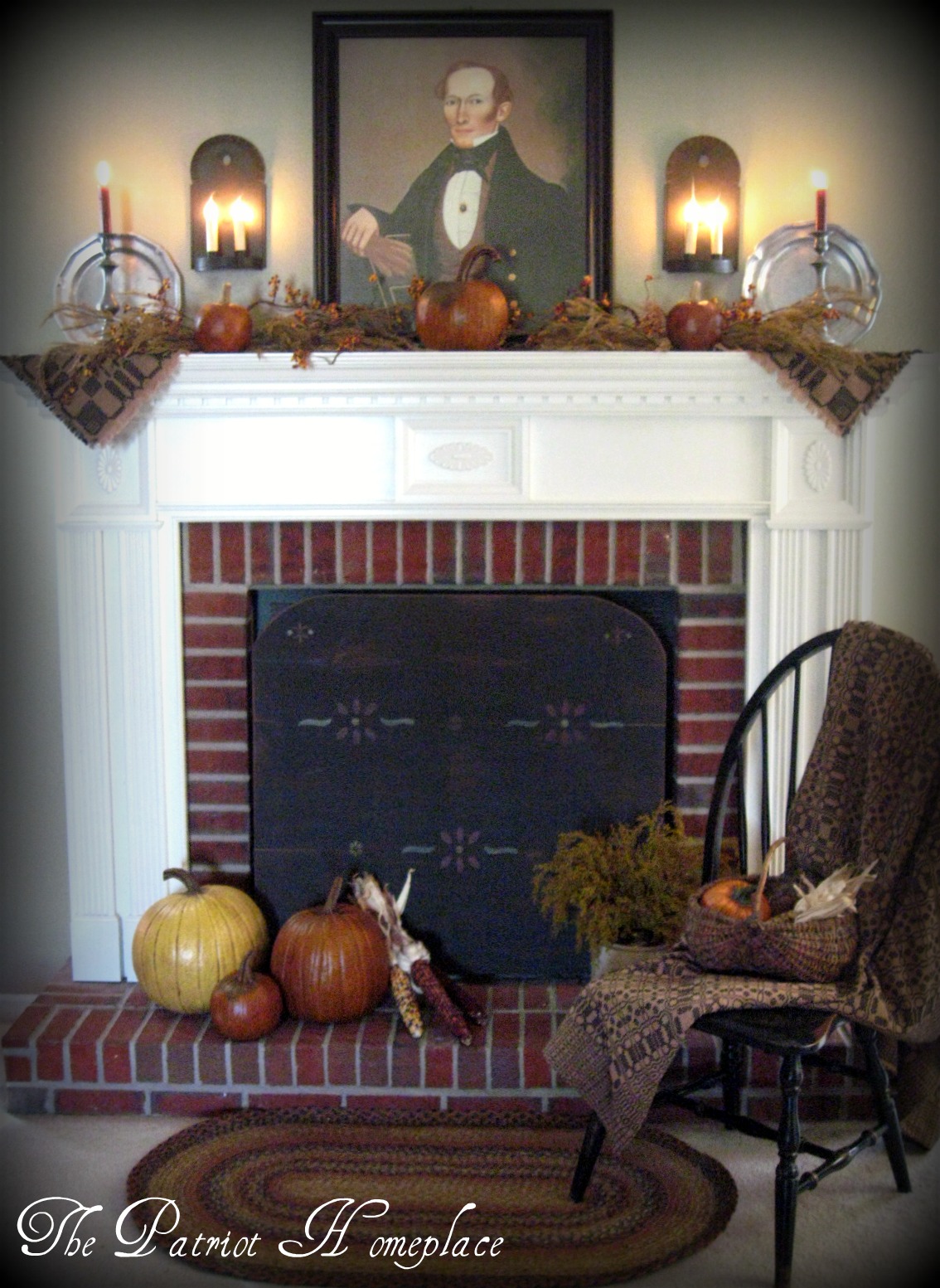 Colonial Style Fireplace with Brick and Wood Surround. Colonial