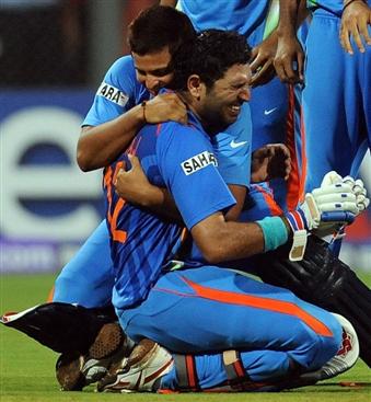 An emotional Yuvraj Singh is embraced by Suresh Raina, India v Sri Lanka, final, World Cup 2011, Mumbai, April 2, 2011