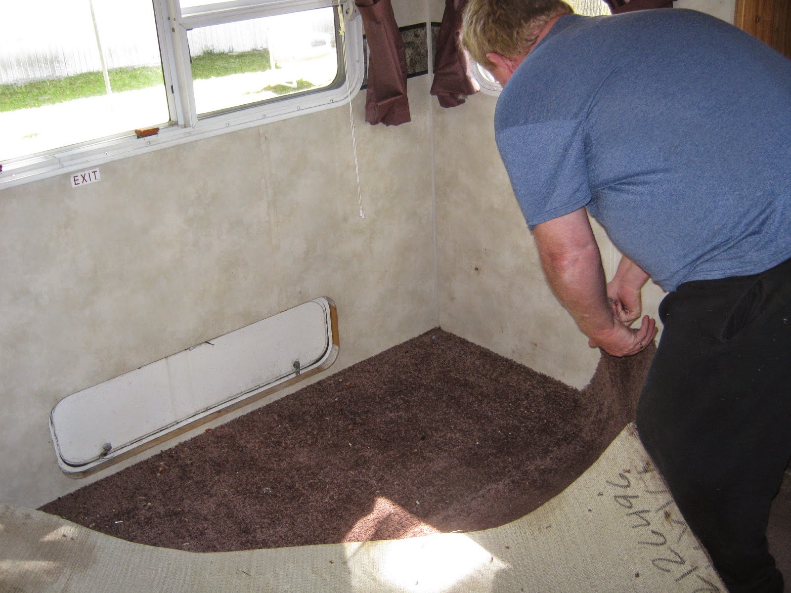 Puma travel trailer water damage RV repair renovate flooring bottom bunk rear storage carpet removal slide http://makingmemoriesrv.blogspot.com/