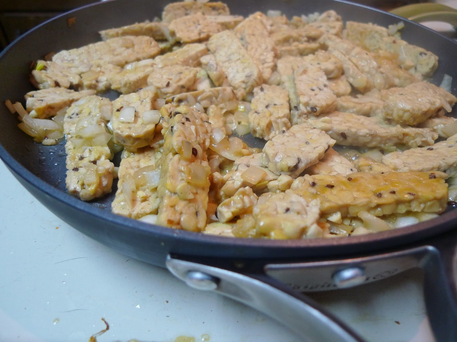 Better Than Never Orange Marinated Tempeh with Collards and Grains